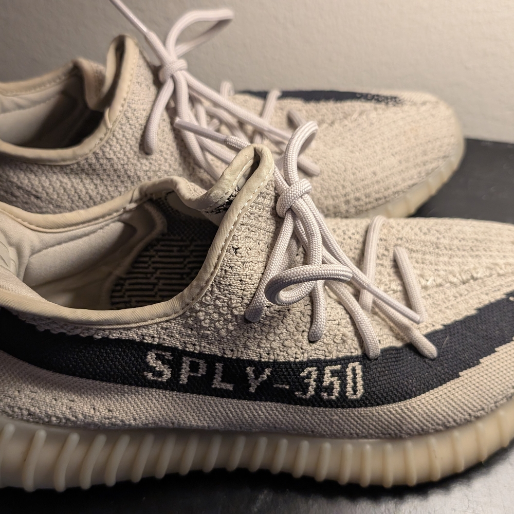 Yeezy Cream and Black Sneakers with Boost Technology